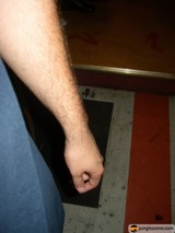 Skater's Hand Holds Board