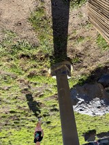 Aerial View of Person Relaxing by Garden Post