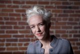 White-haired Lady in Gray Sweater