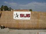 Sub Banner Soars Against Cloudy Sky