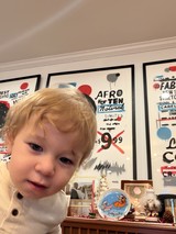 Curious Toddler with Blonde Hair at Home