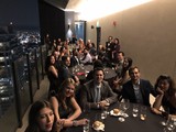Elegant Rooftop Gala with City Lights Backdrop