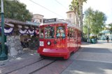 Red Streetcar on a City Road