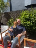 Man and Dog Enjoying the Backyard