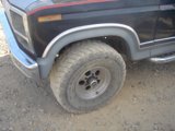 Black Truck with an Alloy Wheel Tire