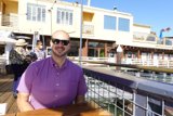 Dave B enjoying the sunny day on the balcony
