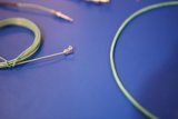 Green Connectors Shine on Blue Background