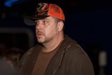 The Man with the Orange Cowboy Hat
