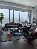 Cozy Living Room with Chic Furniture and Greenery