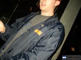 Man in a jacket controls the screen