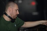 Green Shirt DJ in Action