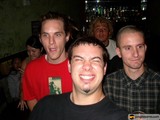 Smiling trio at the bar