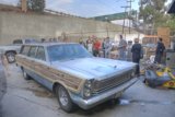A Gathering Around the Automobile