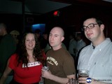 Three Friends Enjoying a Night Out with Beer