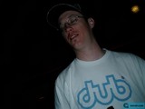 Nighttime Portrait of Andrew T in Hat and Glasses