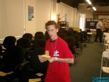Portrait of a Young Man Holding Paper