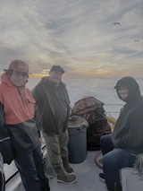 Crab Fishermen at Dawn on Fishing Boat