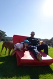 Cherished Moments: Family Time on the Red Couch
