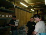 Three Men In a Warehouse