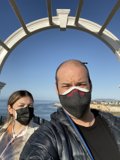 Masked Couple on Pismo Beach Bridge