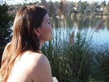 Penelope Gazing Skyward by the Lake