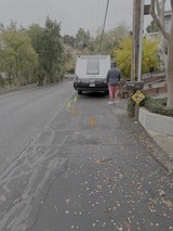 RV Breakdown on Residential Street with Traffic Cones
