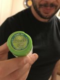 Holding a Green Container