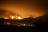 City Lights vs Mountain Fire