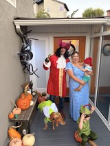 Family Peter Pan Halloween Costume at Decorated Porch