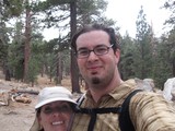 Hikers Pause for Selfie on Mountain Forest Trail