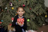A Boy and His Gift Under the Fir Tree