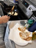 Man Cooking Up a Storm in His Kitchen