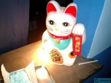 Maneki Neko Figurine on Cream Cake