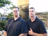 Two Men in Black Shirts