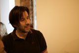 Man with a Beard in Black Polo Shirt