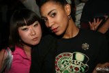Two Friends Strike a Pose in Urban Nightlife