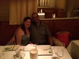 Couple Enjoying a Romantic Dinner at Restaurant