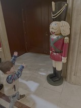 Child Meets Giant Holiday Nutcracker Display