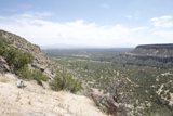 View of a Canyon and Mountain Range from a Hilltop