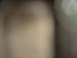 Blurry silhouette of a person under unique lighting