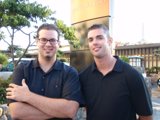 Two Friends in Front of City Building