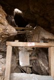 Wooden Shelter in Ancient Cave