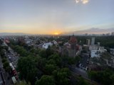 Sun sets over urban metropolis