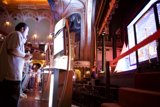Man enjoys video games at a pub