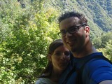 Couple Selfie Amid Lush Mountain Forest Trail