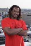 Happy Man in T-Shirt with Dreadlocks