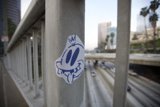 Sticker on Metal Railing