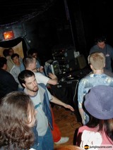 Nightclub Performance with Entertainer in Baseball Hat