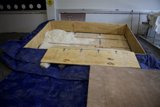 Wooden Crate with Blue Tarp