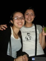 Two Women in Glasses Pose for a Portrait